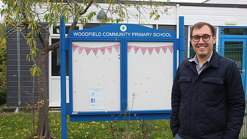 Tom Gordon MP stood outside Woodfield primary school