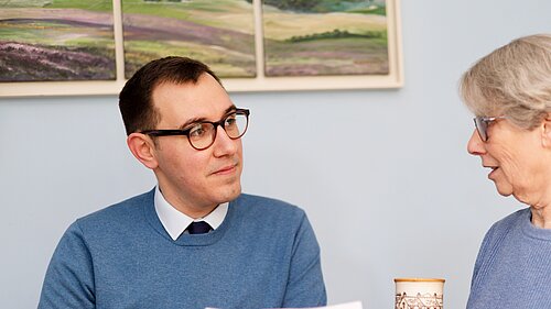 Tom Gordon MP speaking to a constituent about the cost-of-living crisis