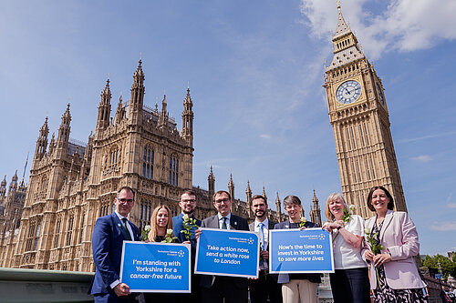Tom Gordon alongside the team from Yorkshire Cancer Research stood in front of the Houses of Parliament