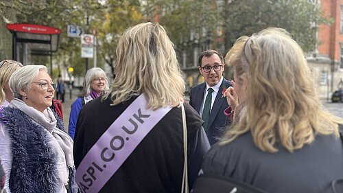 Tom Gordon with WASPI women on a street in London