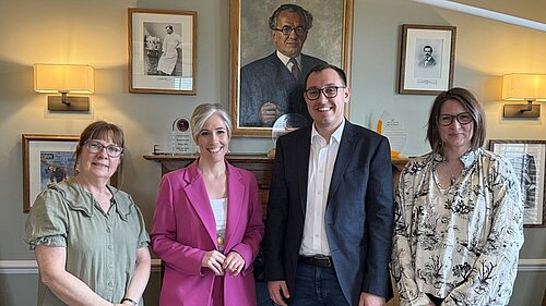 Tom Gordon and Daisy Cooper MP with representatives of Bettys & Taylors