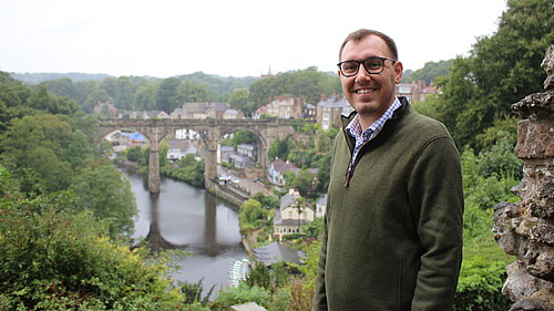Tom Gordon MP at Knaresborough Castle with a view of the viaduct 
