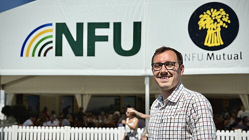 Tom Gordon MP in front of the NFU Tent at the Great Yorkshire Show
