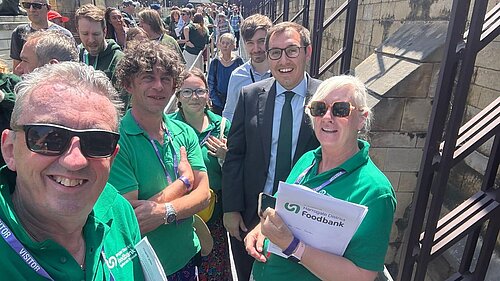 Tom Gordon and four foodbank volunteers in Parliament