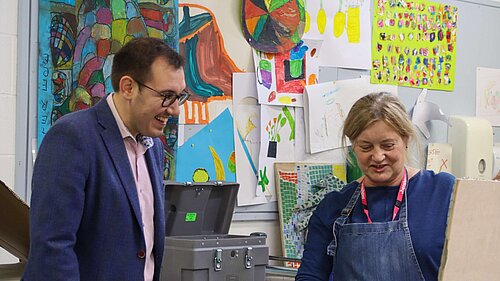 Tom Gordon MP, observing Arts & Crafts in a classroom