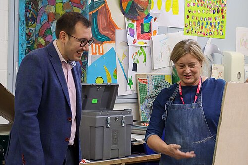 Tom Gordon MP, observing Arts & Crafts in a classroom