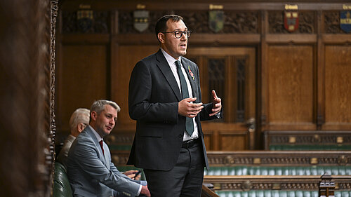 Tom speaking in parliament 