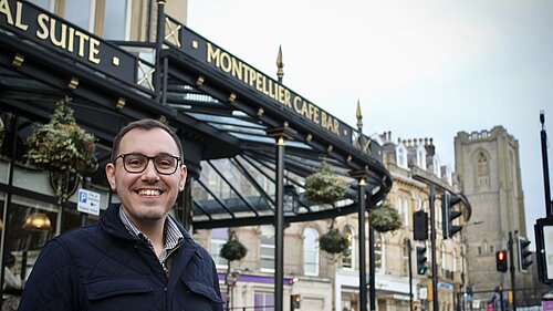 Tom Gordon MP stood outside Betty and Taylors tea room