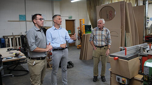 Tom Gordon stood being shown around Claro Enterprises