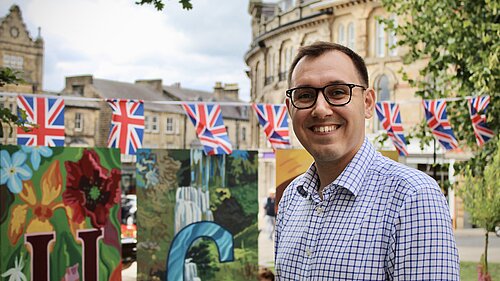 Tom stood in Harrogate with a smile on his face.
