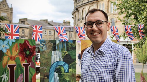Tom stood in harrogate.