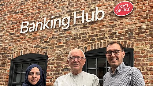 Tom Gordon MP with Andrew Hart and Asma Ola in front of the Knaresborough Banking Hub