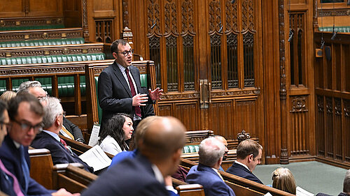 Tom speaking in parliament