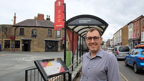 Tom Gordon stood at Knaresborough bus station