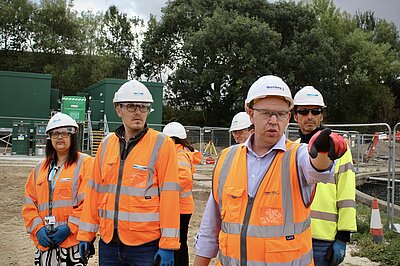 Tom Gordon MP being shown around the sewage works