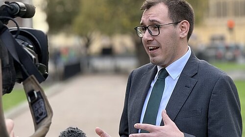 Tom Gordon MP being interviewed.