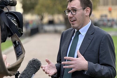 Tom Gordon MP being interviewed.